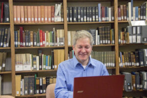 Justin S. Friar conducting genealogical research at Godfrey Memorial Library